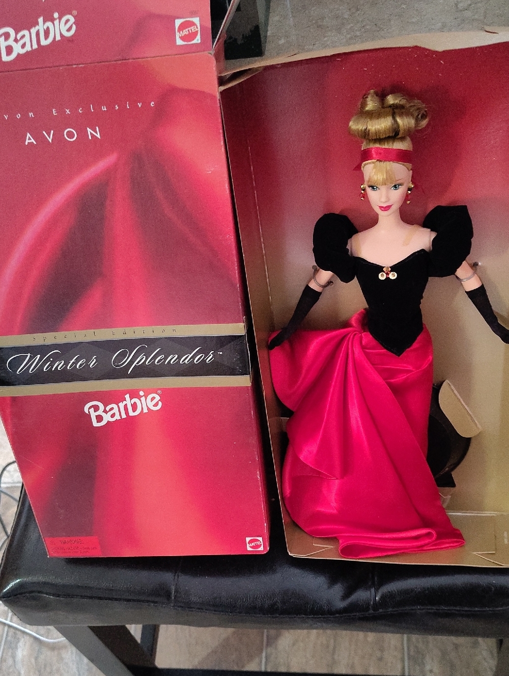 1994 Avon Winter Splendor Barbie Doll - Black & Hot Pink Gown